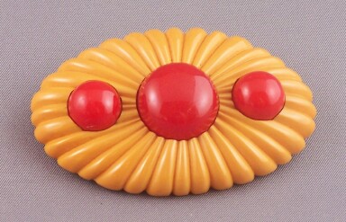 BP183 deco carved oval bakelite pin